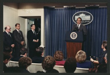 Senator Bob Dole announcing INF Treaty as President Ronald Reagan looks on, 1987